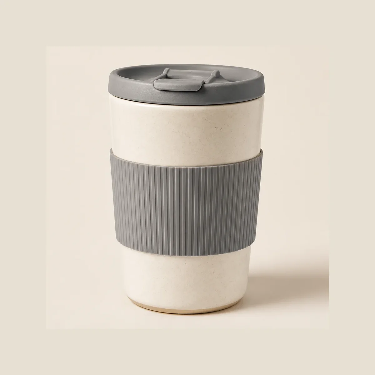 Ceramic travel mug with sleeve